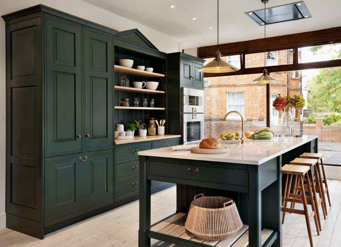 Sleek kitchen design with black raised panel cabinets and multifunctional island 