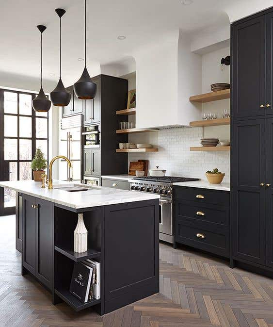 White walls with black kitchen cabinets and small island Kitchen Design