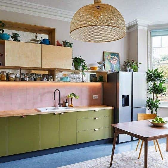 Flat Panel Green Kitchen Cabinets with wood countertops, farmhouse kitchen sink and open shelving 