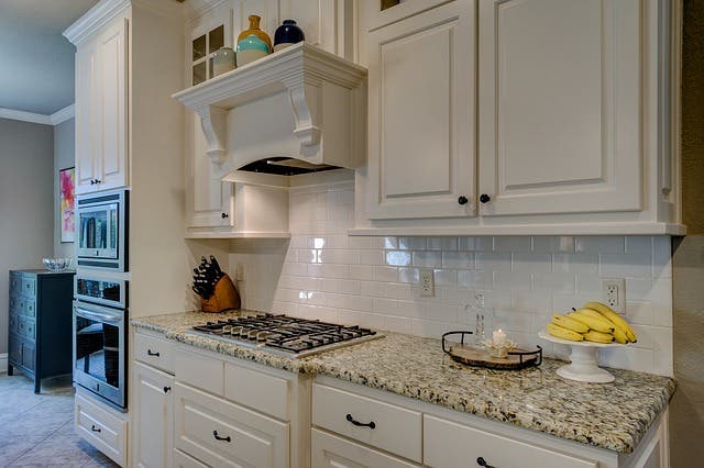 rustic kitchen with white ready to assemble cabinets