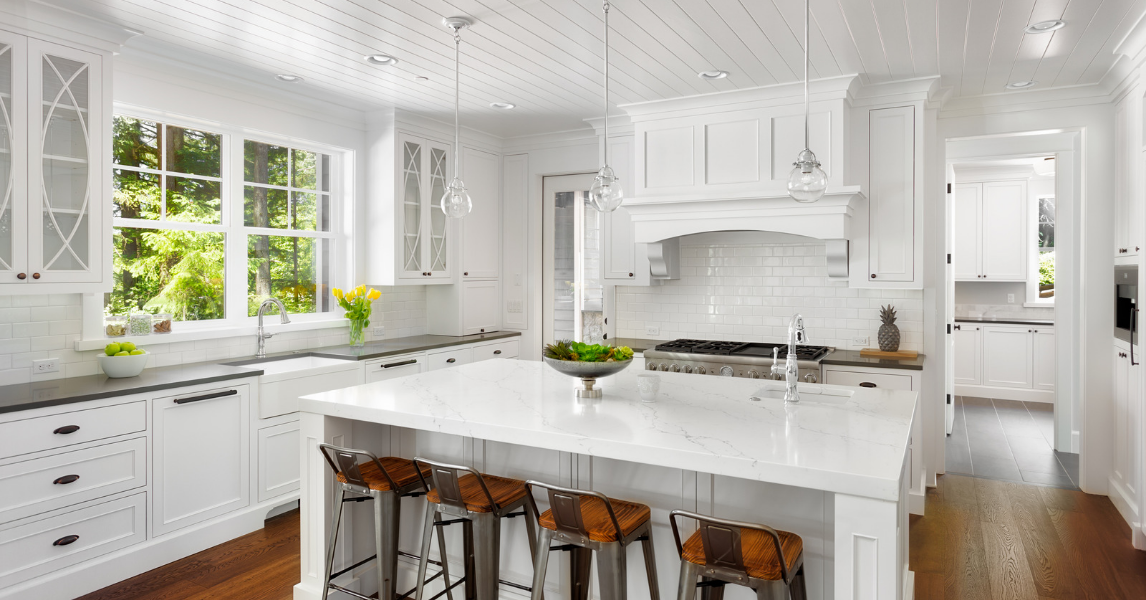 white kitchen cabinet with light hardwood floor