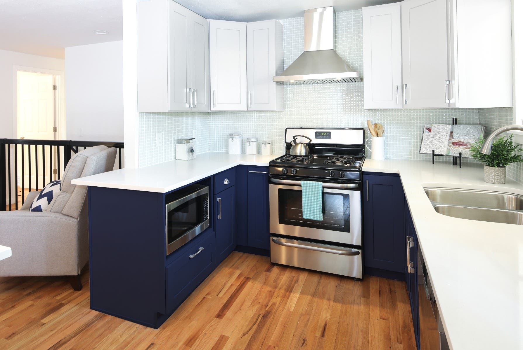 navy blue and white painted kitchen cabinets