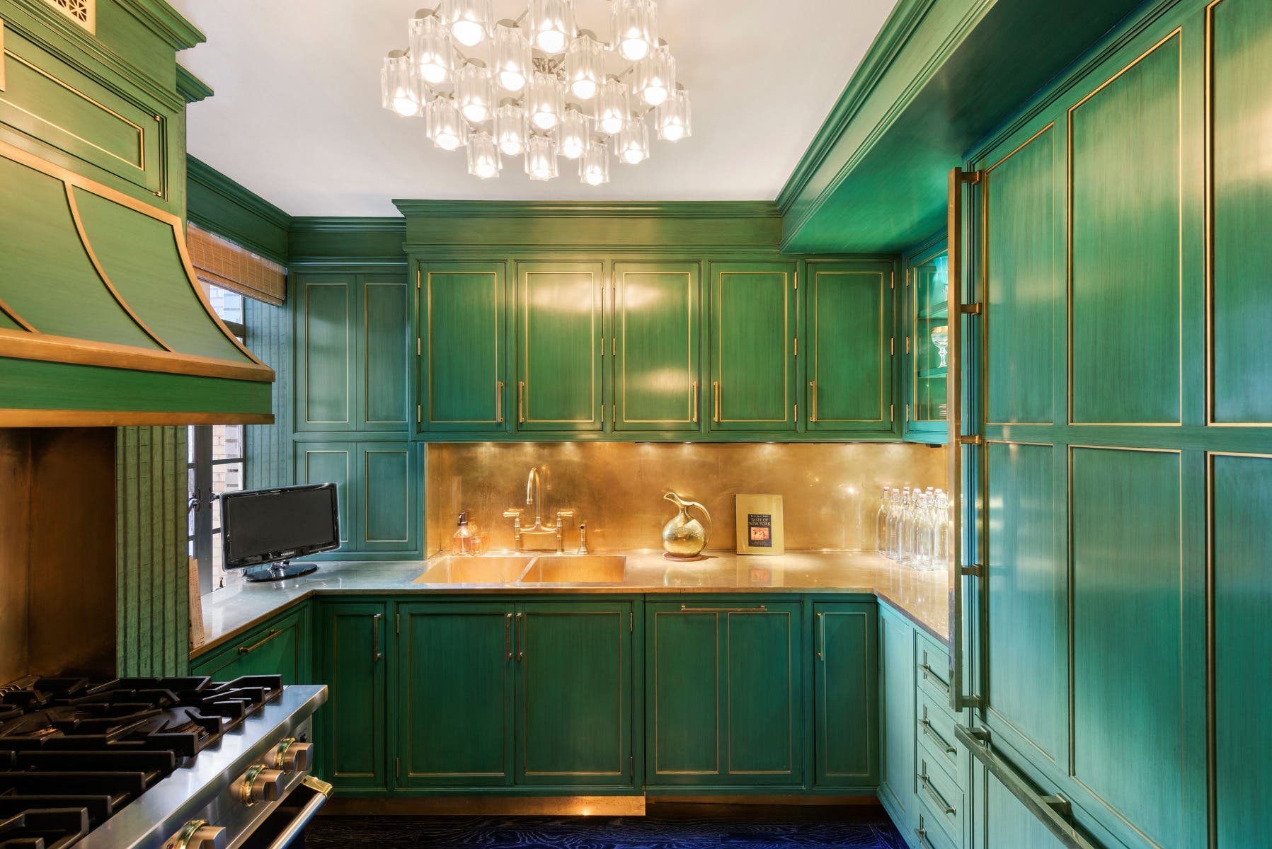 Green Kitchen cabinets Pair with minimal gold accents