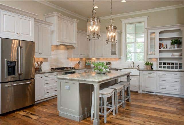 Greige wall color paired with off white kitchen cabinets