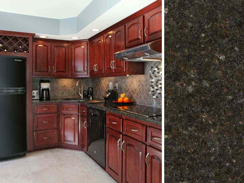 Black Countertops with Cherry Cabinets