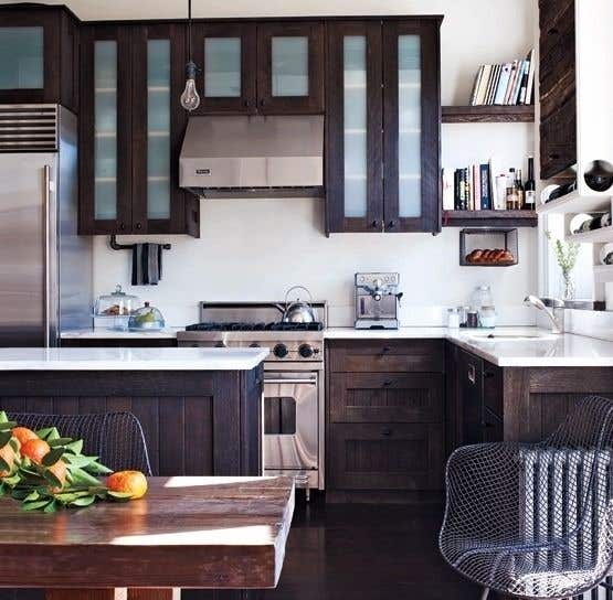 Kitchen design features brown shaker cabinets, glass front upper cabinets, white countertops and backsplash, and open shelving. 