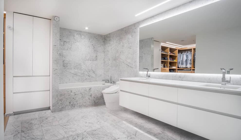 modern white minimalist bathroom with tile