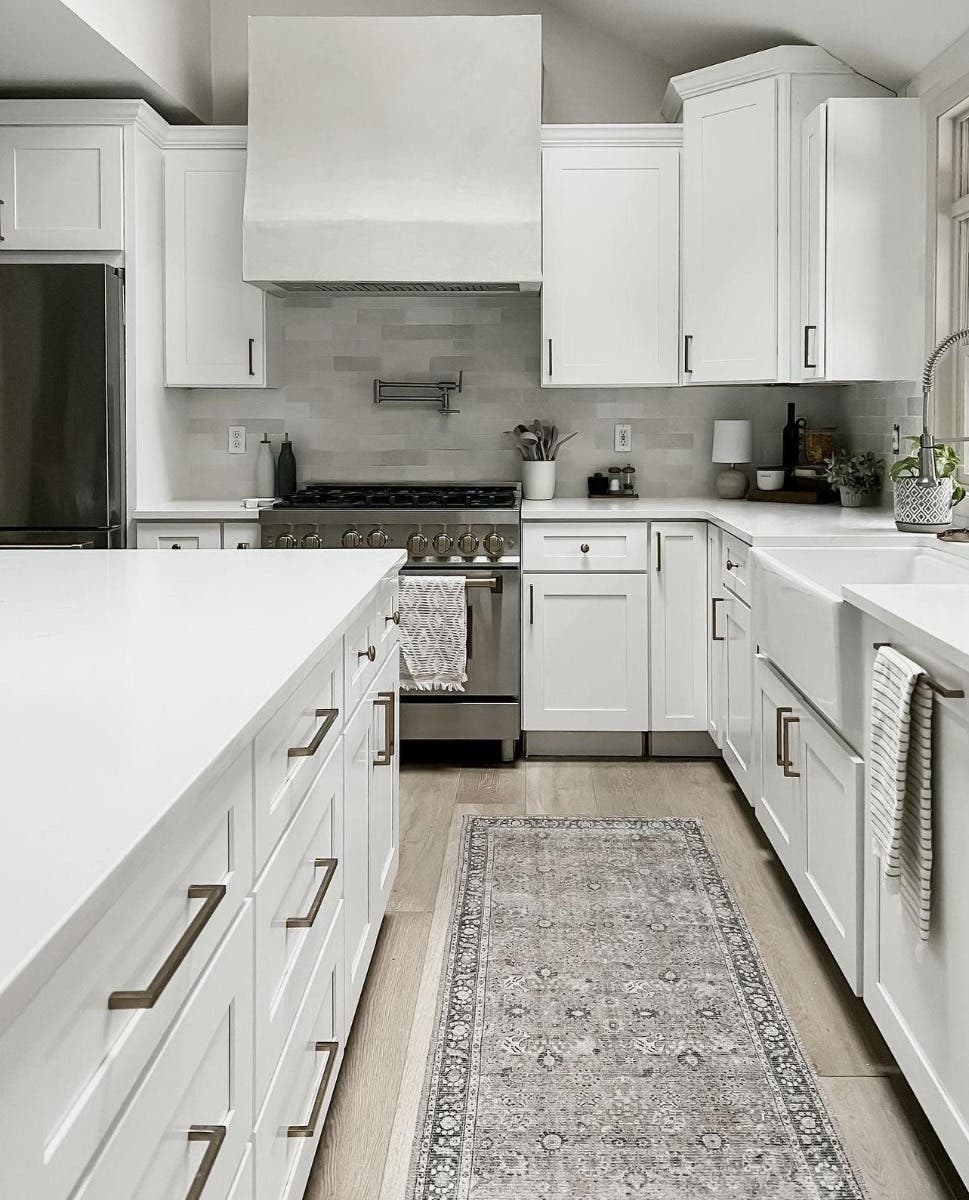 White Cabinets kitchen with gold pulls