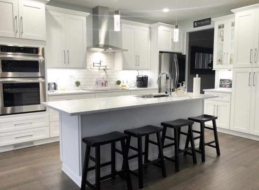 white shaker cabinets with under cabinet lighting