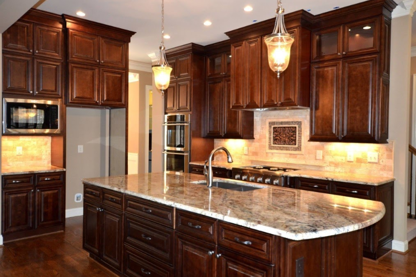 brown cabinets with under-cabinet lighting