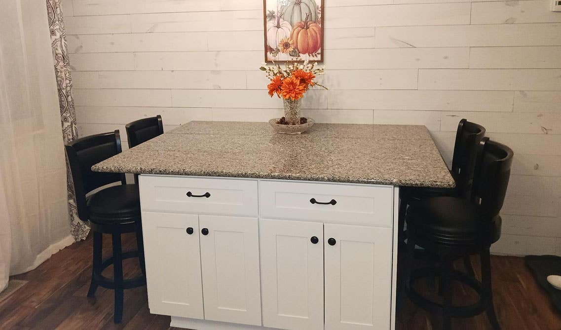 Dining room with Shiplap Wall and wall art