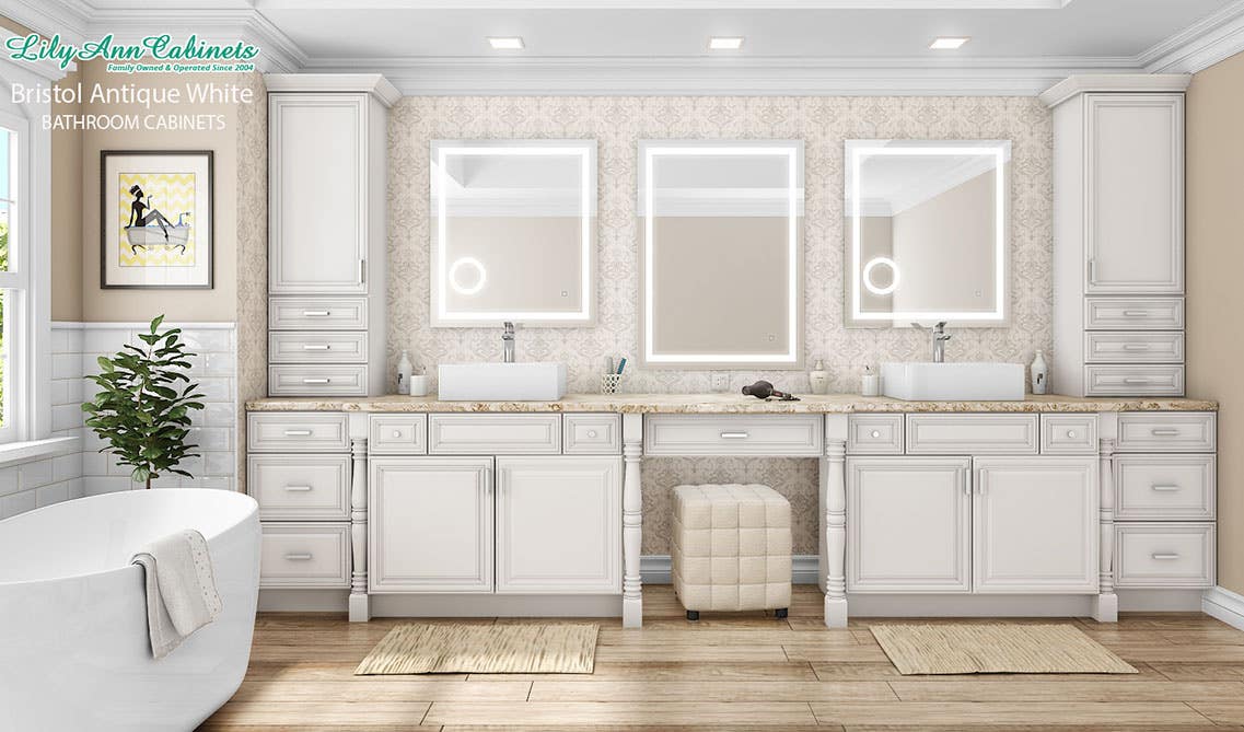 Bathroom design with antique white cabinets, free standing bathroom tub and flooring 