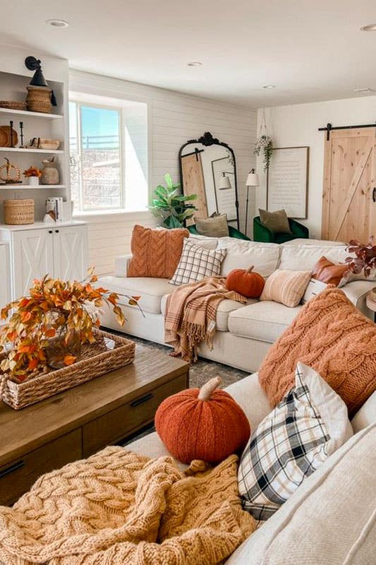 fall decor themes through throw pillows, blankets, tablecloths, and even wall art.