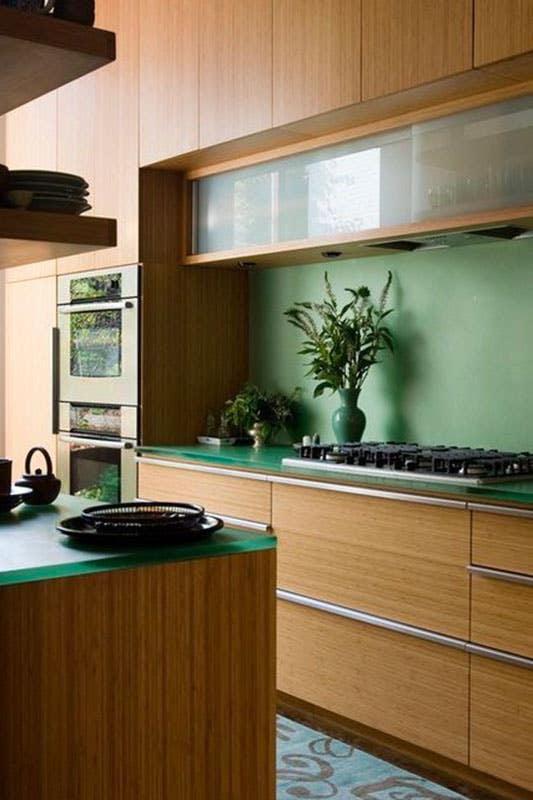 Bamboo Cabinets with Green Glass Countertop