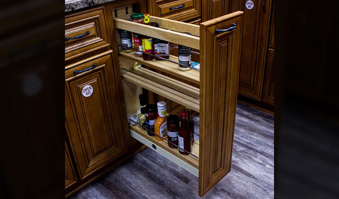 Base Cabinet Pull-out Organizer with Wood Adjustable Shelves in brown cabinets