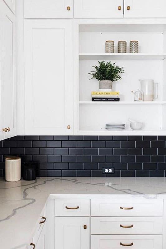 Black Brick Backsplash with open shelves and bright white cabinets