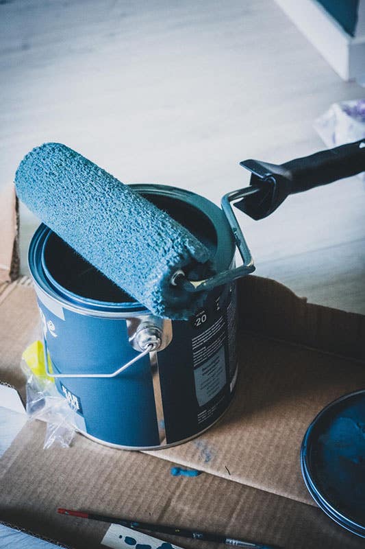 Blue paint box and paint brush