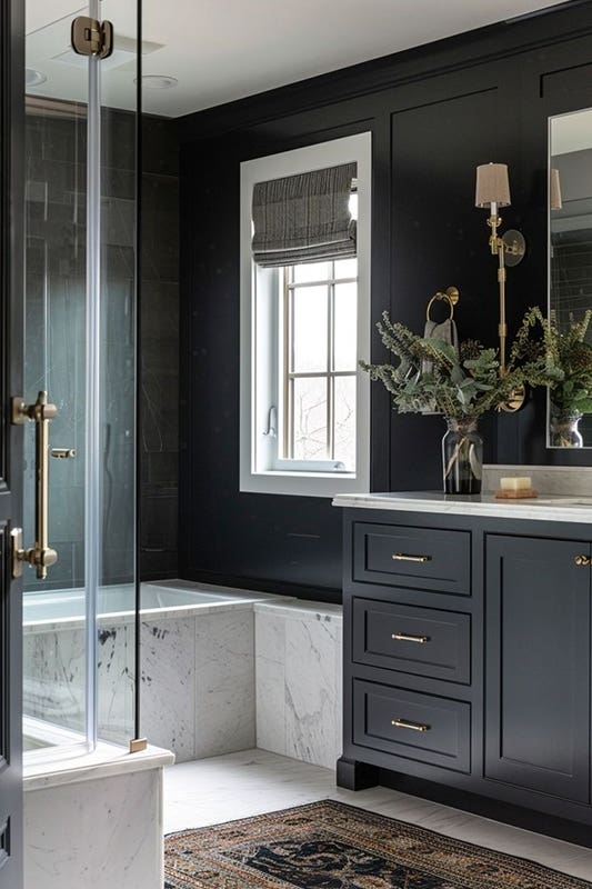 Bold black bathroom paired with gold hardware and white marble flooring 