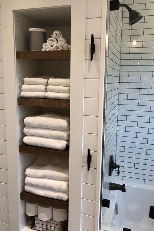 Built-in wall Niches with towels and tissues 