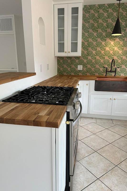 Butcher Block Countertop with white cabinets