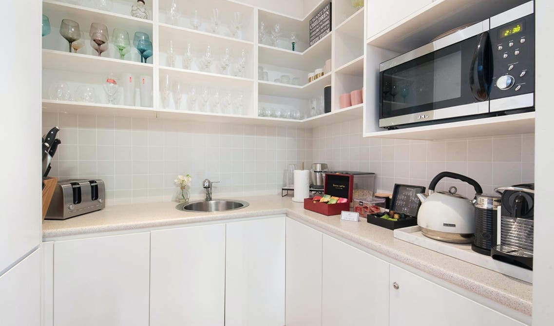 White kitchen design with Butler pantries