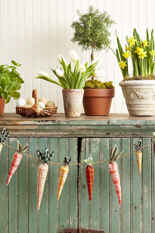 carrot garland on green cabinets