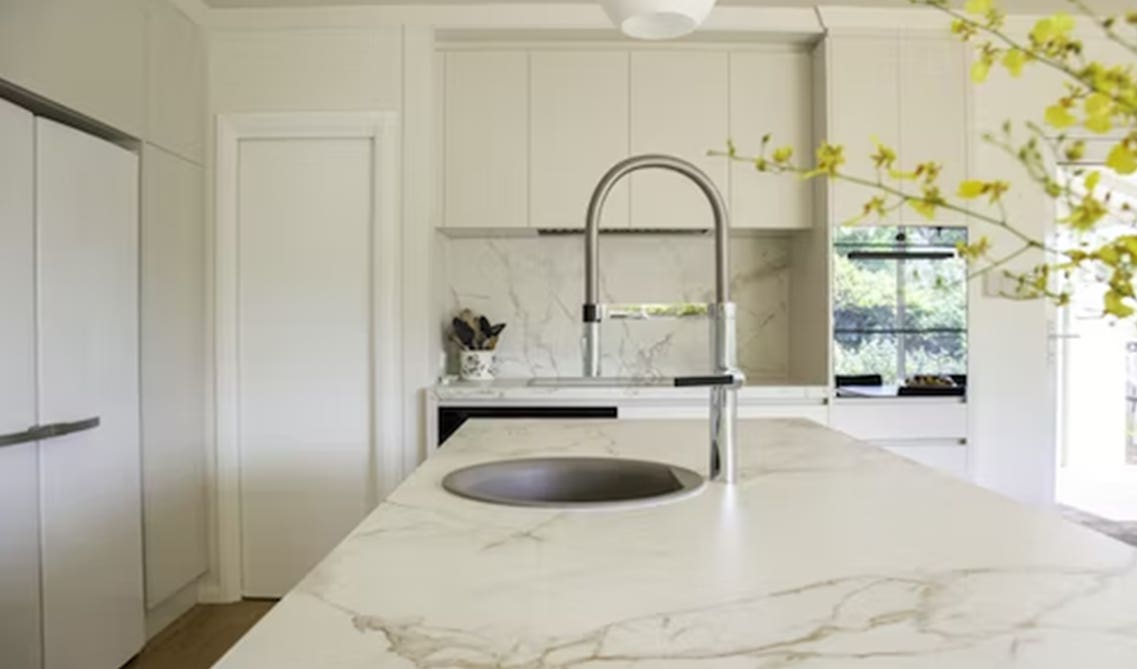 Classic white kitchen with New Venetian Gold granite