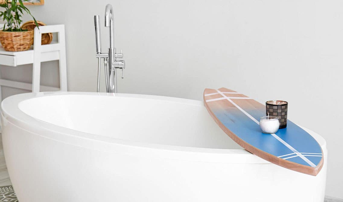 Coastal Style bathroom with Freestanding Jacuzzi Tub and floating shelves 