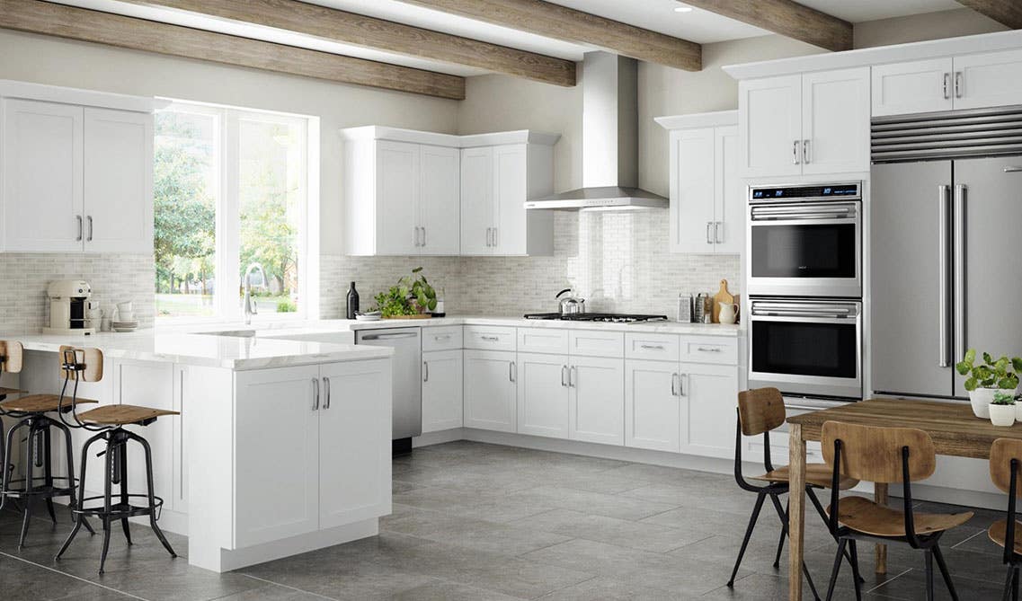 Cohesion backsplash with white cabinets