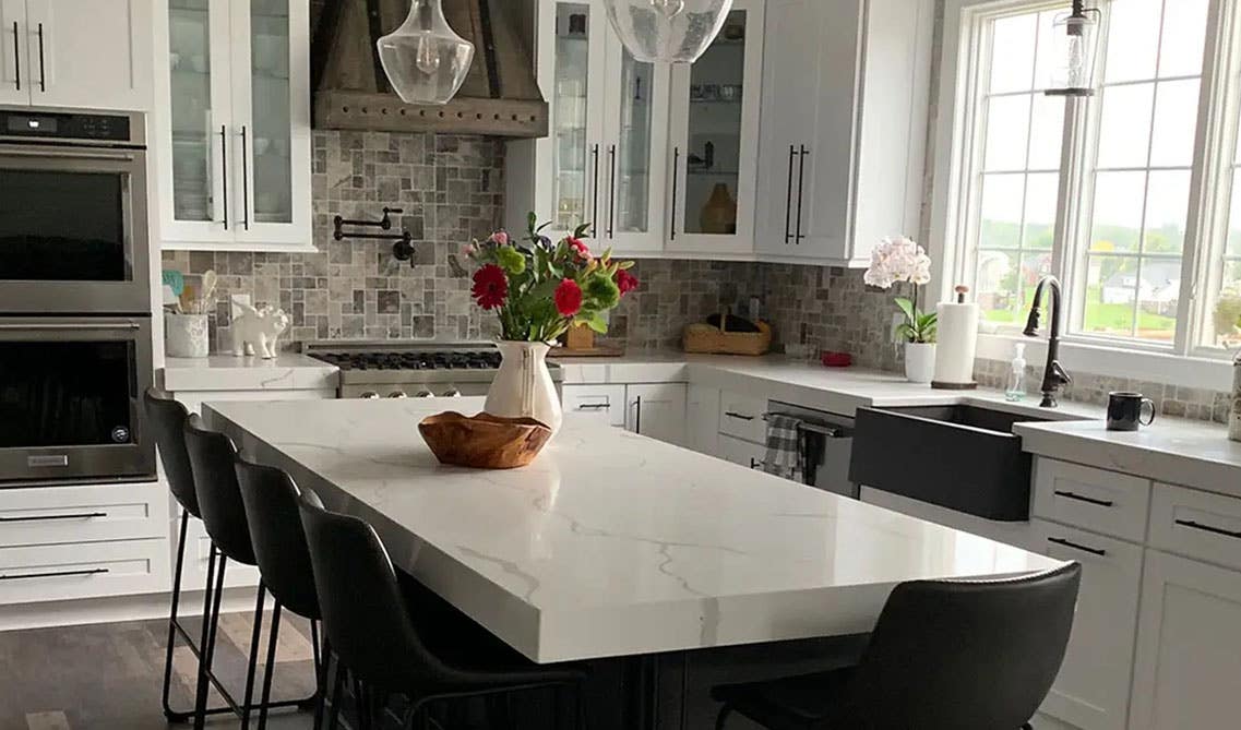 Colorado White Shaker Cabinets with Marble Countertop and Stainless Steel Appliances 