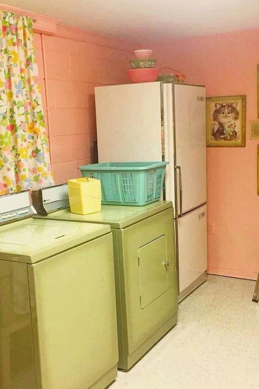 Laundry room with colorful appliances