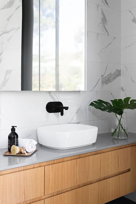 floating wooden vanities with marble top and white sink, large mirror, Ceramic Wall tile