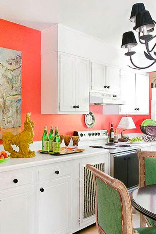 Coral kitchen wall color with white cabinets