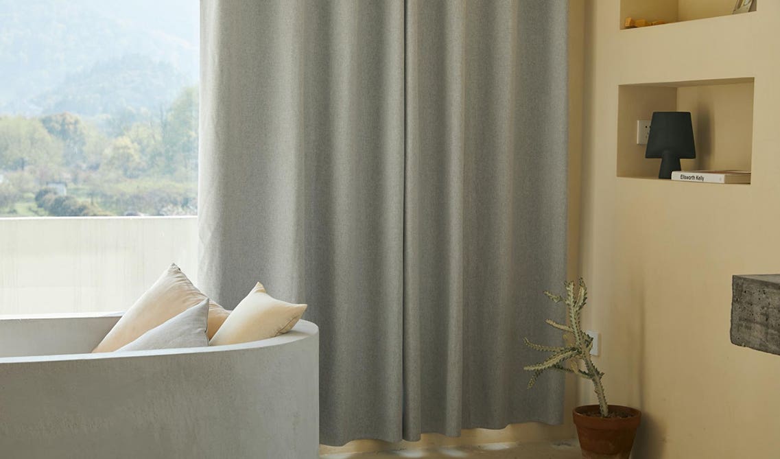 Grey curtains and grey sofa set 