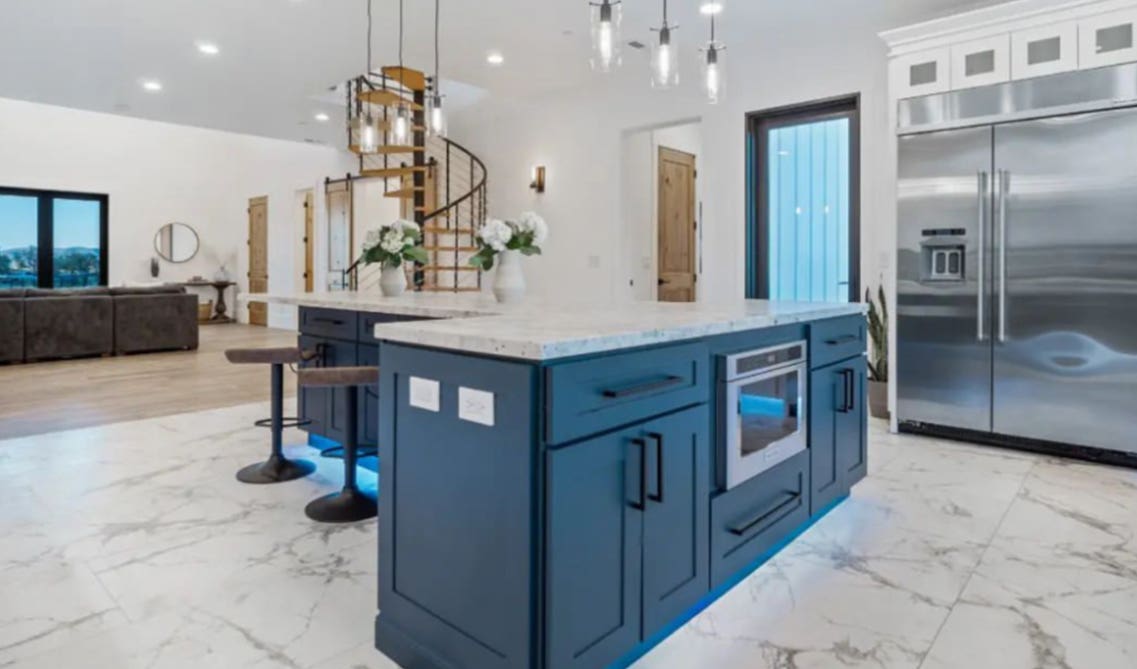 Dark blue Kitchen with white marble island 