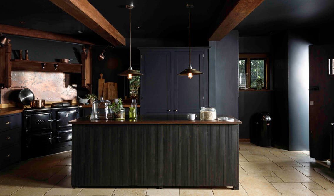 kitchen features an eclectic mix of old and new finishes for a design that is truly unique