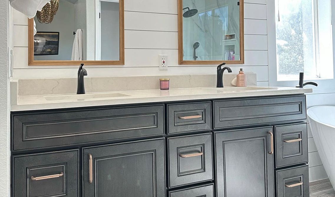Driftwood double vanities paired with gold pulls 