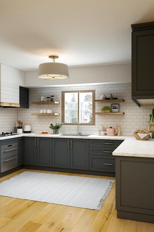 Farmhouse kitchen with dark color cabinets and subway tiles backsplash 