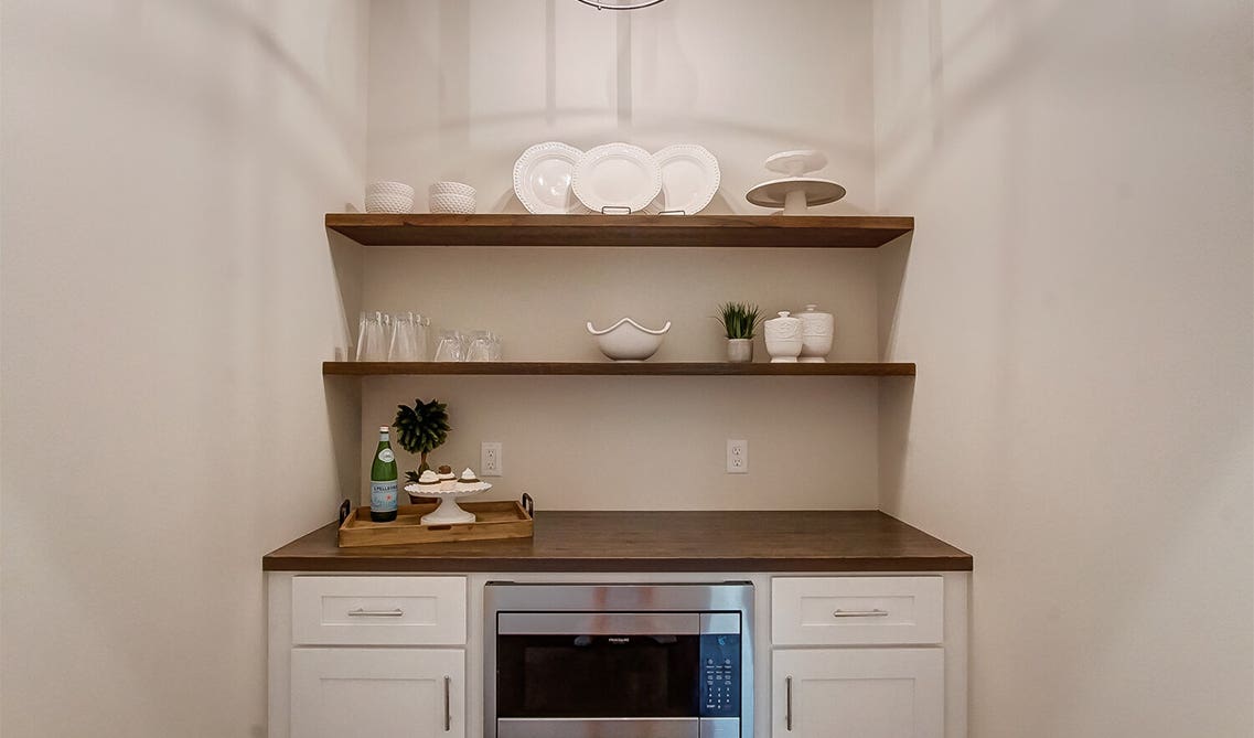 Floating Shelves with white cabinets