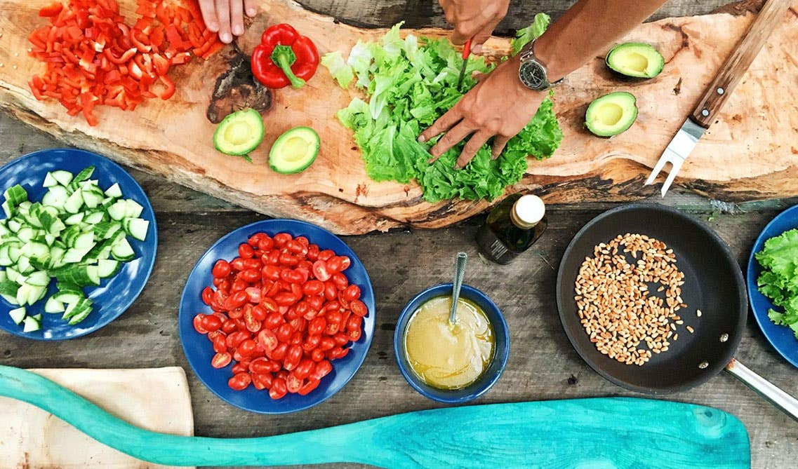 Food preparation in outdoor kitchen 