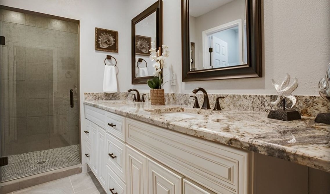 Freestanding Bristol linen vanity paired with marble countertop 