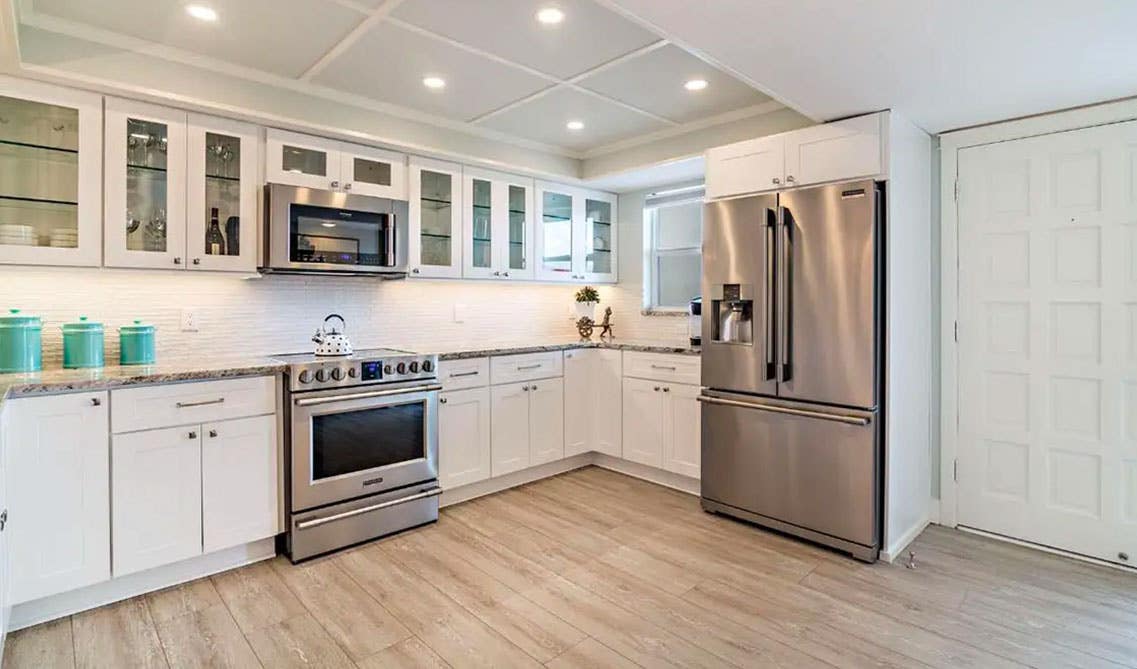 Kitchen with Glass Panel door cabinet