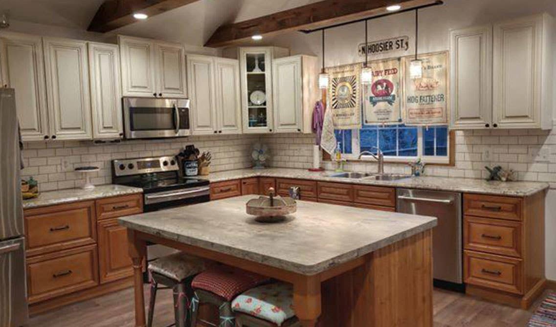 Granite Countertops with natural kitchen cabinets