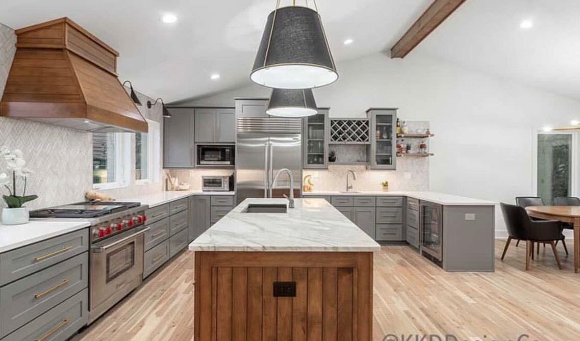 Grey Shaker Elite Cabinet Paired with Wood Island and White Marble Countertop