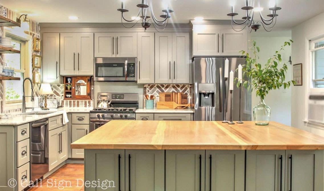 Grey Shaker Elite cabinets kitchen with island and stainless steel appliances 