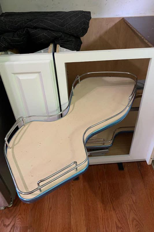 Pull-out corner cabinet shelves