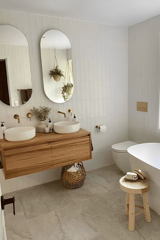 Ivory Bathroom paired with floating vanity and free standing bathtub 