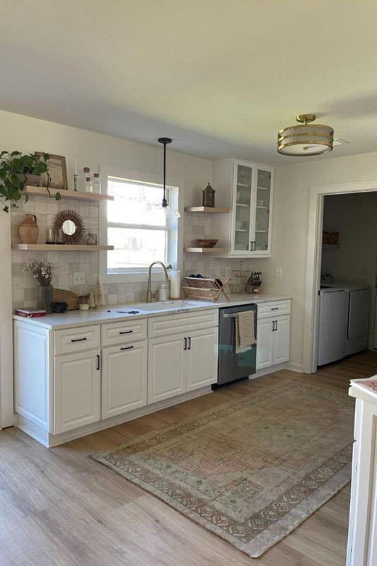 single wall kitchen design with key largo cabinets with glass door and floating shelves