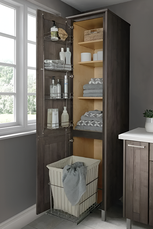 Linen cabinets with towels, toilet paper, and door organizer