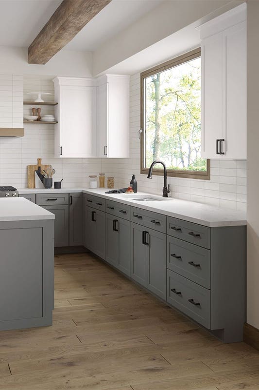 MDF cabinets paired with matt black fixture and white marble countertop